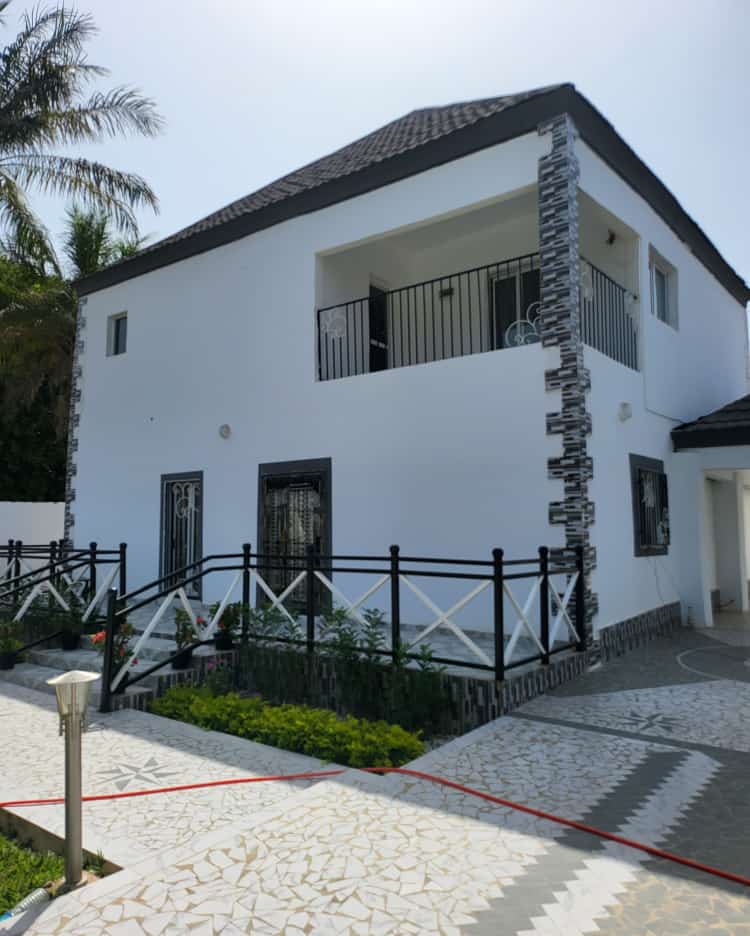 4 bedrooms downstairs three bedroom upstairs beautiful compound. Itï¿½s not far from the highway going price D13 million with negotiation.