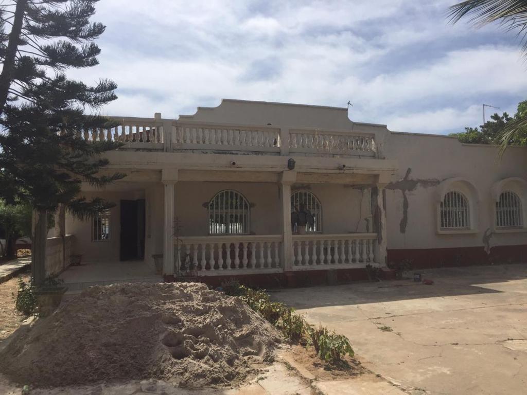 Three bedrooms with two master bedrooms house and a boys quarter in a big land space for sale at a reasonable frice of D6million